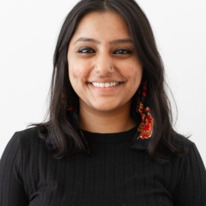 Roshan is an Indian female wearing a black shirt.